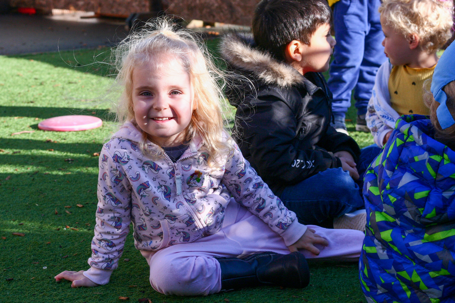 Pre-School Girl Smiling in Garden